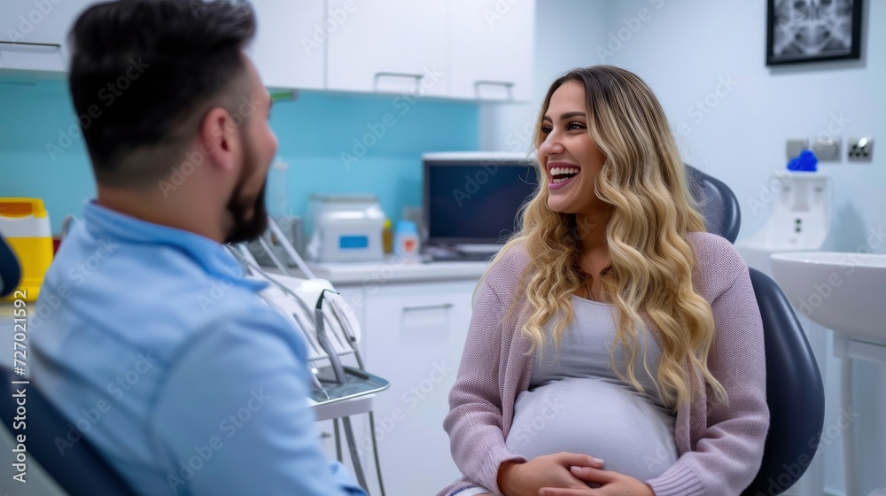 A pregnant woman with flowing blonde hair, discussing the effects of pregnancy on oral health with her dentist,