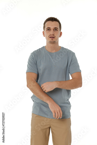 handsome young calm man on white background