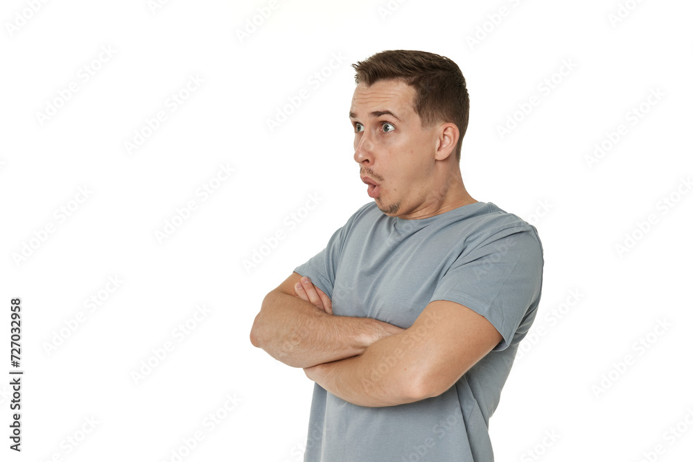 surprised guy looking at camera on white studio background surprised guy looking at camera on white studio background