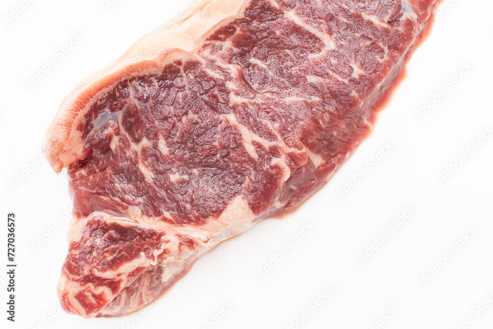 Raw pork steak on a white background
