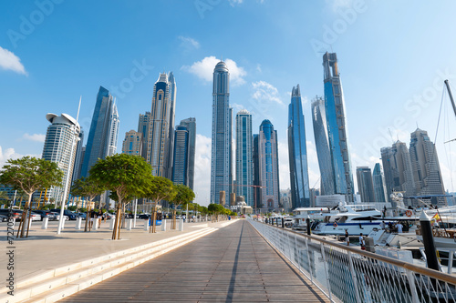 Dubai marina harbor on a sunny day in the UAE