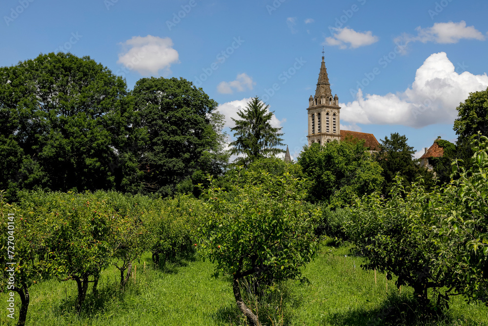Orchard and church in Cergy, France