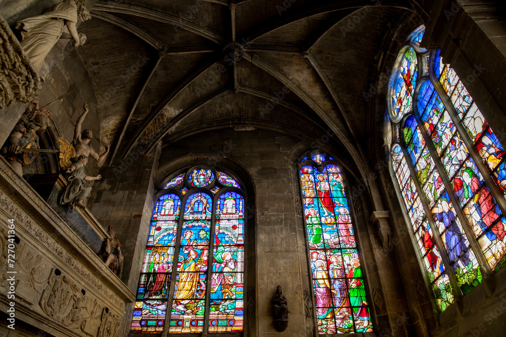 Chapel in Saint Maclou cathedral, Pontoise, France. Stained glass