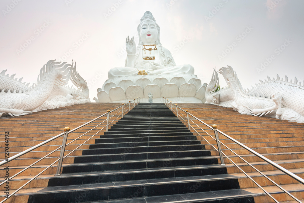 Many steps,leading up to the Big Buddha,Wat Huay Pla Kang temple,Chiang Rai,Northern Thailand. - obrazy, fototapety, plakaty 