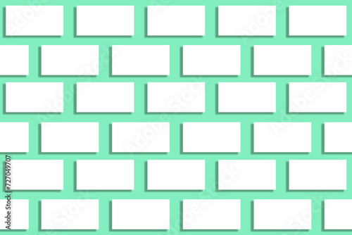 Mockup of horizontal stacks of white business cards arranged in rows on a green textured paper background.