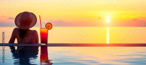 Romantic couple sipping long island iced tea on paradise beach in warm sunny summer with copy space