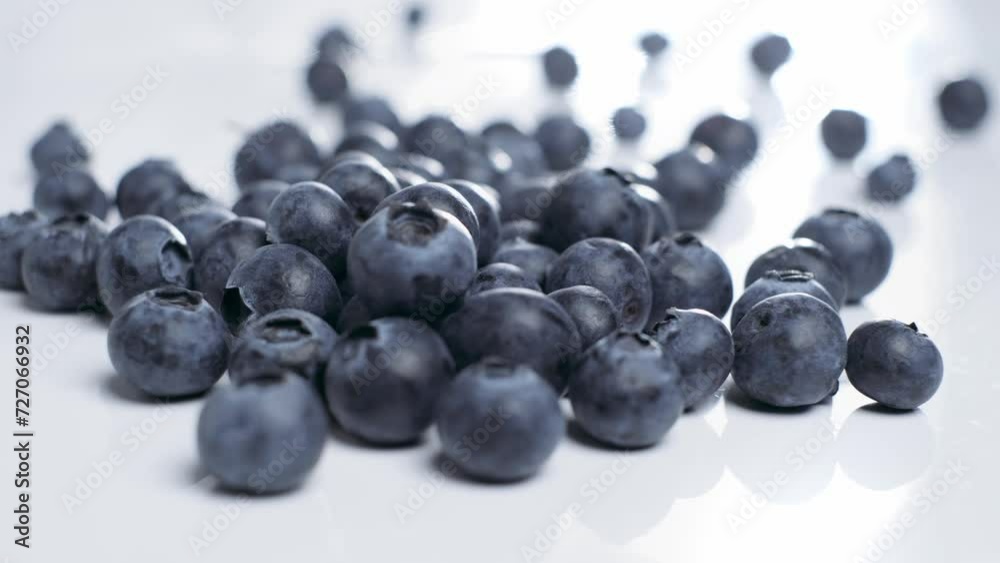 Dolly in shot toward Fresh Blueberries on white table, rack focus, Healthy fruit Dolly in shot toward Fresh Blueberries on white table, rack focus, Healthy fruit