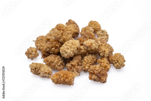 Dried white mulberry on white background photo