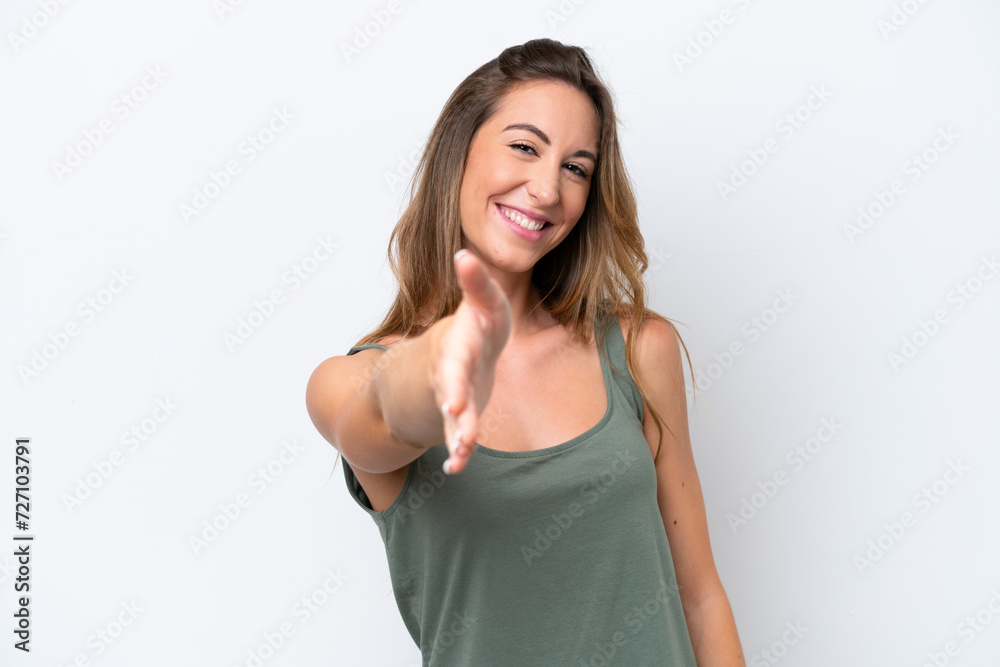Young caucasian woman isolated on white background shaking hands for closing a good deal Young caucasian woman isolated on white background shaking hands for closing a good deal