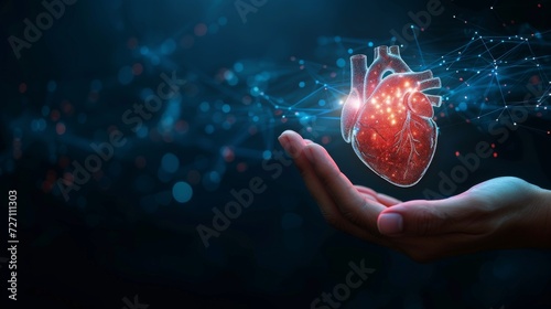 Hand holding virtual hologram heart shape with cardiogram  photo