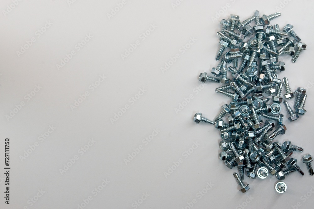 Self Tapping Sheet Metal Screws on a White Background with Copy Space Self Tapping Sheet Metal Screws on a White Background with Copy Space