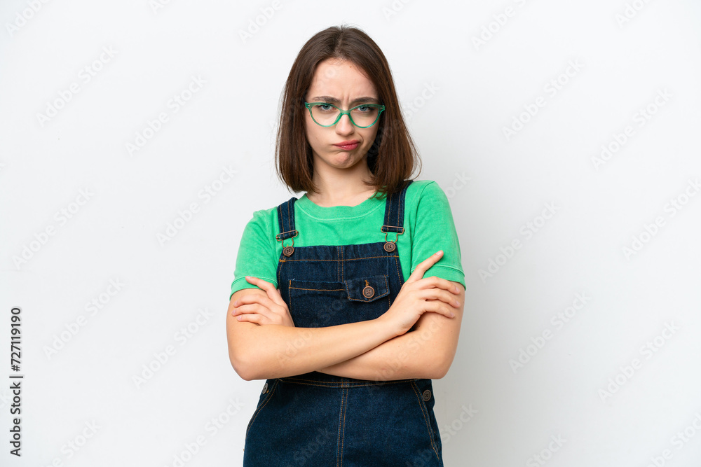 Young Ukrainian woman isolated on white background with unhappy expression Young Ukrainian woman isolated on white background with unhappy expression