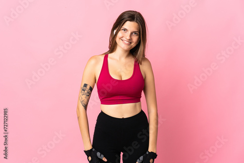 Young slovak woman isolated on pink background happy and smiling
