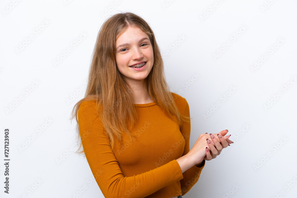 Teenager Russian girl isolated on white background applauding Teenager Russian girl isolated on white background applauding