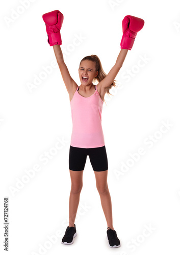 Full length portrait of a strong sportswoman standing with arms up, isolated over white background