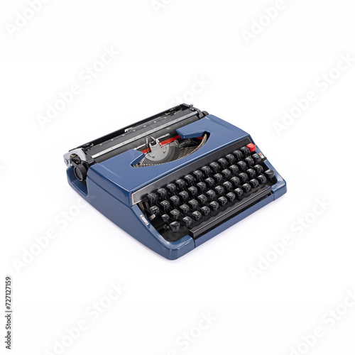 Foto Three-quarter front view of vintage blue portable manual typewriter isolated on