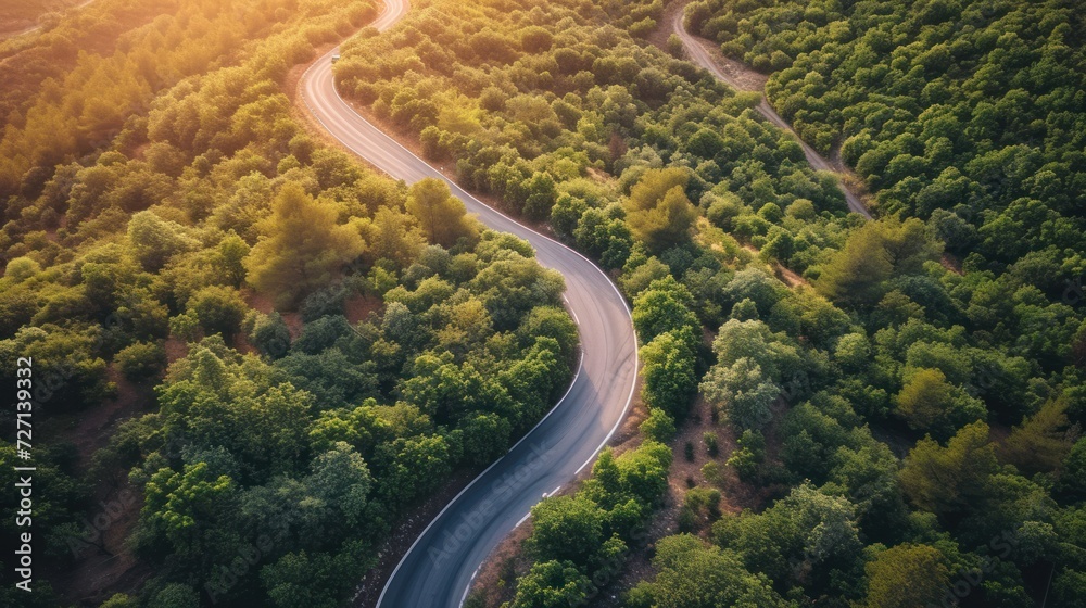 Fototapeta premium Bird's eye view of driving on a winding road.