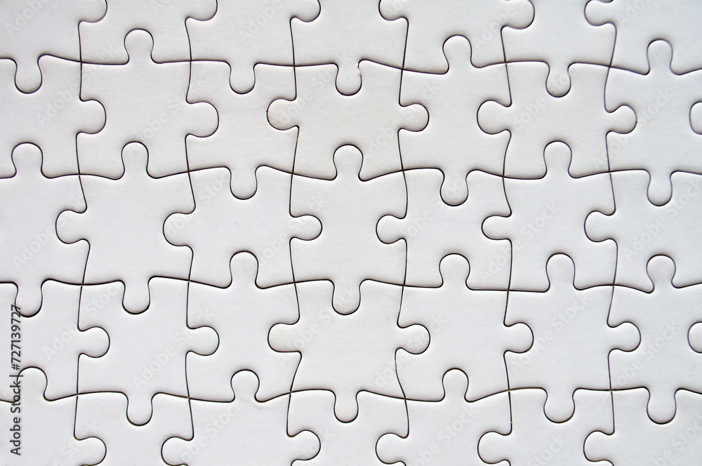 Top view of white jigsaw puzzle. Gaming concept Top view of white jigsaw puzzle. Gaming concept