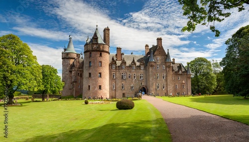glamis castle in scotland on a summer day photo