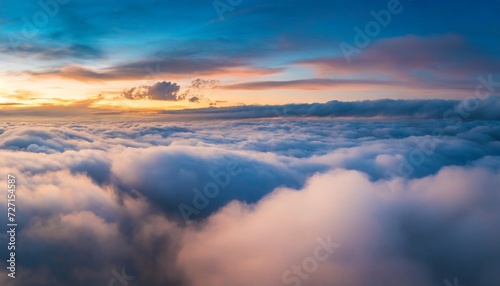 view of the clouds from above at dawn