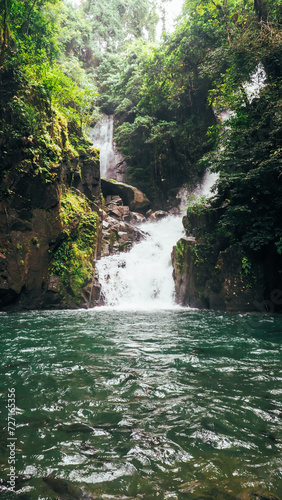 Namtok Phlio, Phlio waterfall with bokeh from water spray on the camera lens at Phlio Waterfall National Park, Chanthaburi, Thailand