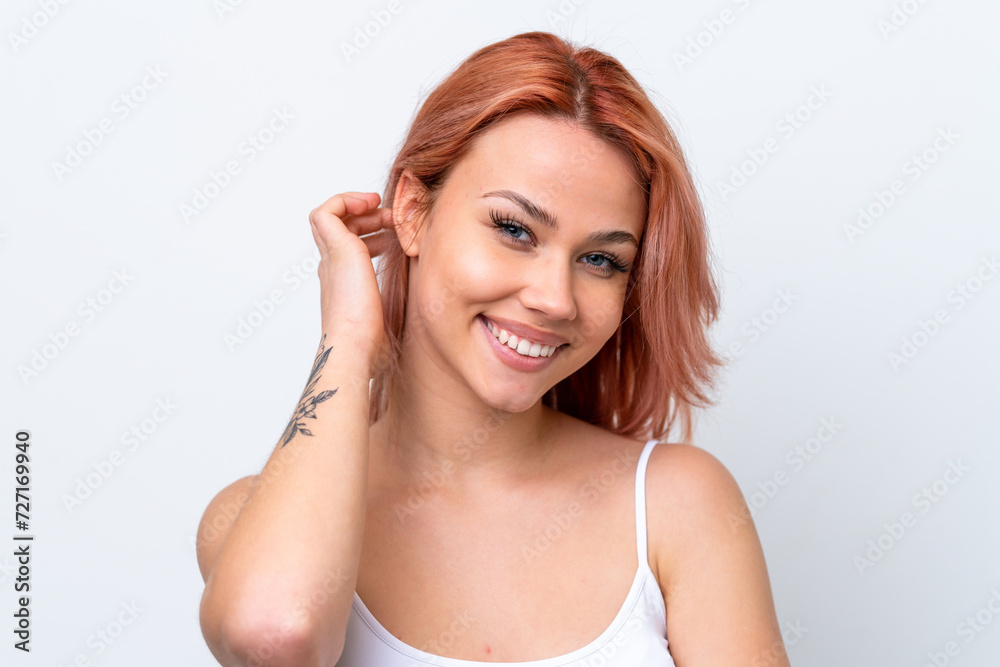 Young Russian girl isolated on white background with happy expression. Close up portrait