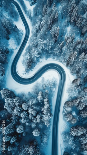 Aerial view of the winding Snake Road in winter in the Dolomite Alps of Italy © Nicola