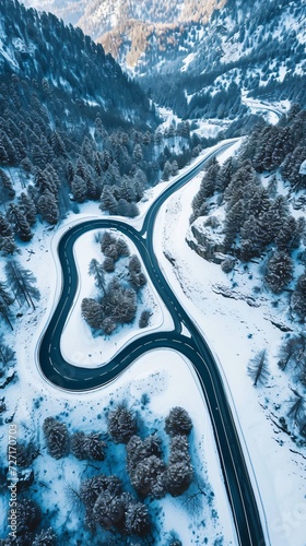 Aerial view of the winding Snake Road in winter in the Dolomite Alps of Italy