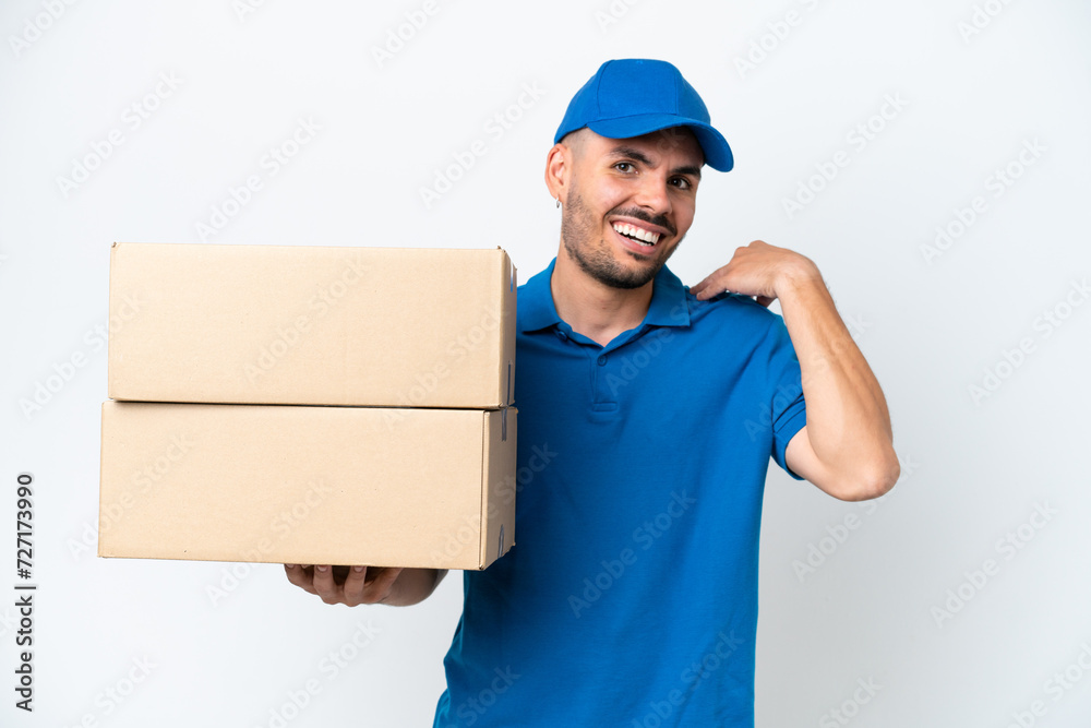 Delivery caucasian man isolated on white background laughing Delivery caucasian man isolated on white background laughing