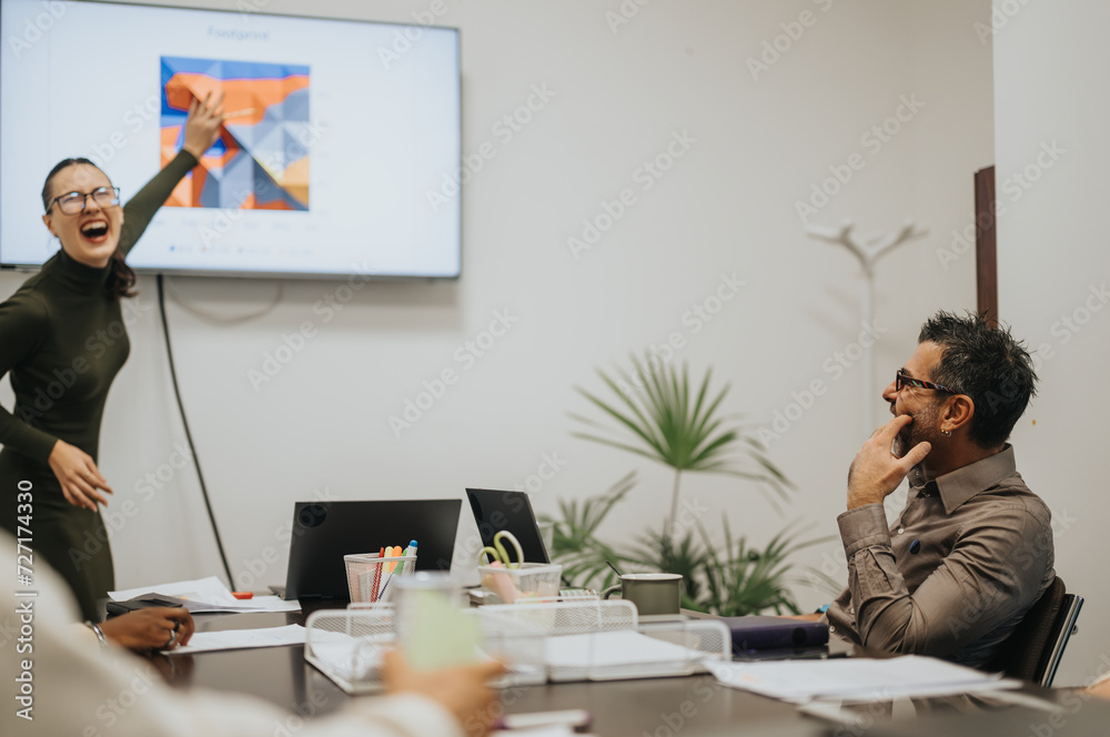 A diverse group of business people collaborating in a boardroom meeting, analyzing statistics for business growth and profitability in a positive atmosphere at modern office setting. A diverse group of business people collaborating in a boardroom meeting, analyzing statistics for business growth and profitability in a positive atmosphere at modern office setting.