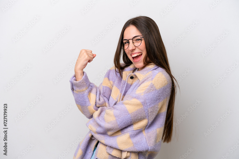 Young girl isolated on white background celebrating a victory Young girl isolated on white background celebrating a victory