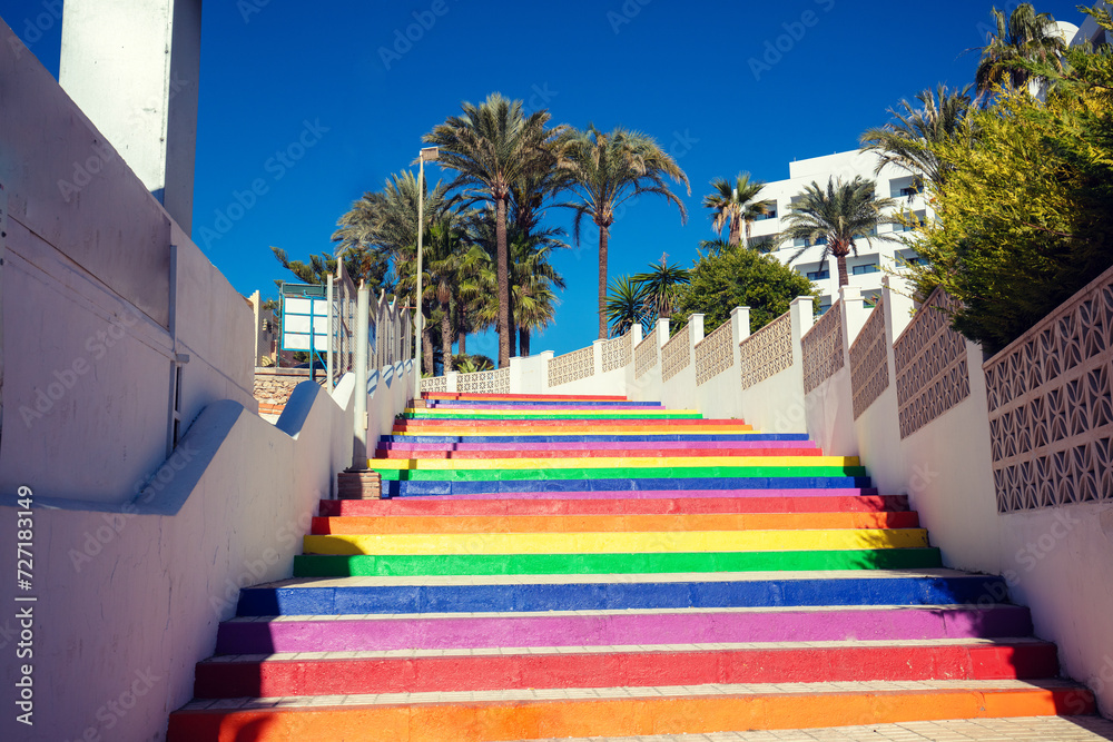 Colorful staircase in the park. The steps are painted in rainbow colors. Nerja, Malaga, Spain
