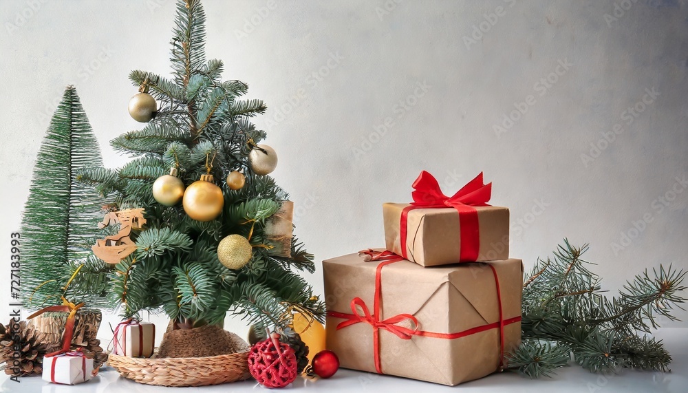 composition with christmas tree and gifts on white background
