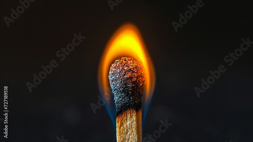burning match on black