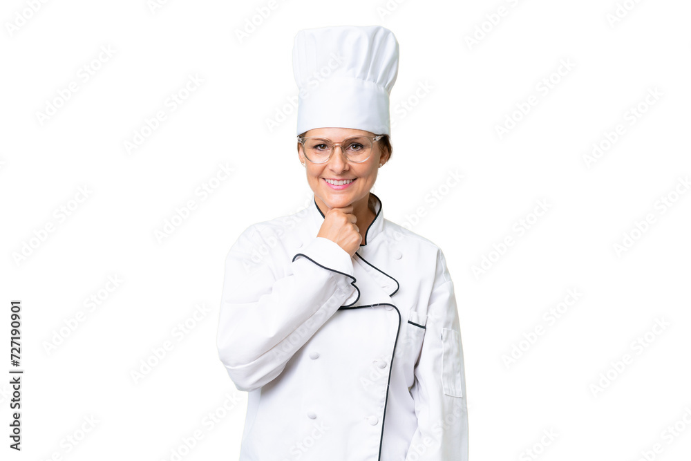 Middle-aged chef woman over isolated background with glasses and smiling Middle-aged chef woman over isolated background with glasses and smiling