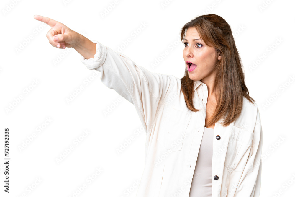 Middle age woman over isolated background pointing away Middle age woman over isolated background pointing away