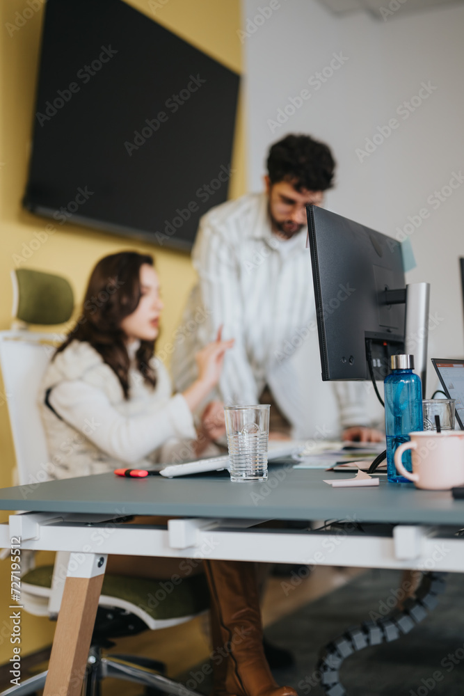 Business coworkers collaborating and brainstorming ideas in a creative office. Business coworkers collaborating and brainstorming ideas in a creative office.