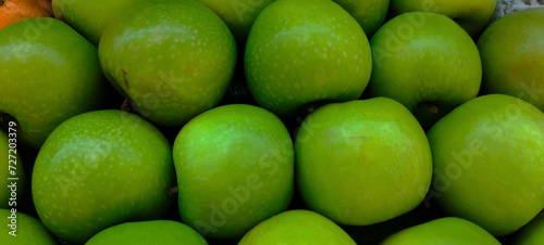 MAKASSAR, INDONESIA Asia, February 2 2024 neatly arranged green apples for sale in a shop