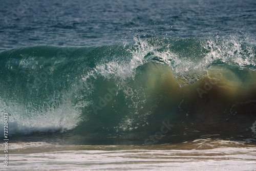 wave breaking on the beach
