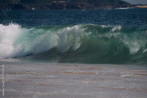 wave breaking on the beach