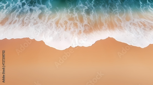 Sandy beach with light blue transparent water waves and sunlight, tranquil aerial beach scene