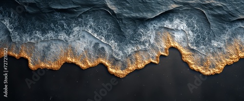 Aerial View of a Beach With Waves and Sand
