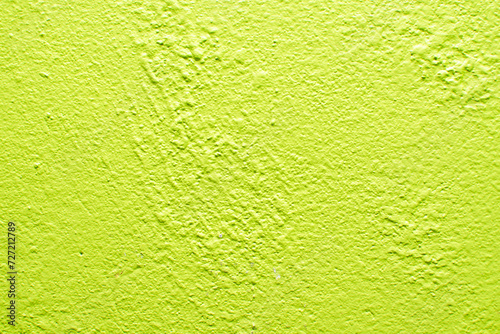Imagen de una pared con textura rugosa color verde photo