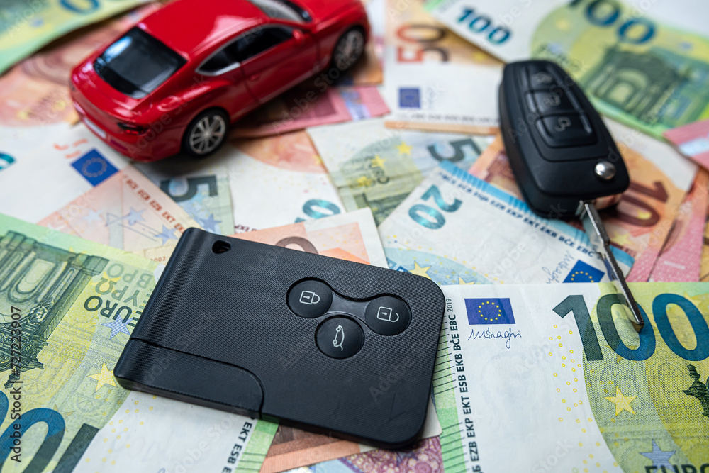 buy or sell or insurance car as toy car and key on euro banknotes buy or sell or insurance car as toy car and key on euro banknotes