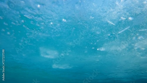 Wallpaper Mural Panorama of thin ice on the surface of river on turquoise sky background, Underwater view, Slow motion, Ice diving. Ice drifts along the river. Frozen water surface Torontodigital.ca