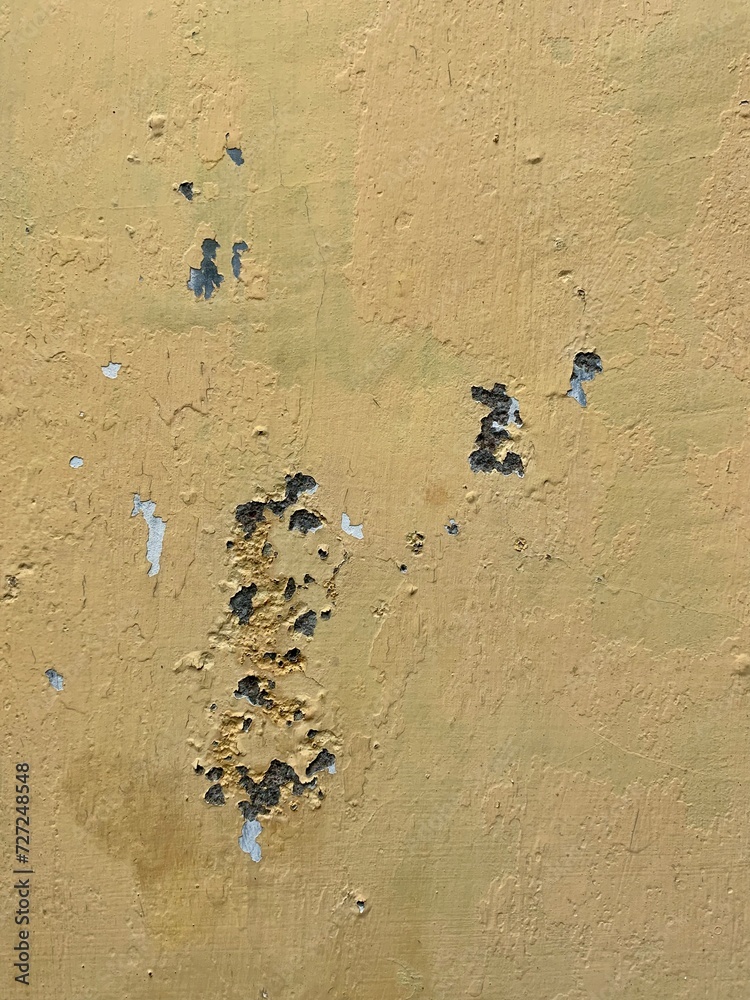 Old wall paint peeling, exterior building.