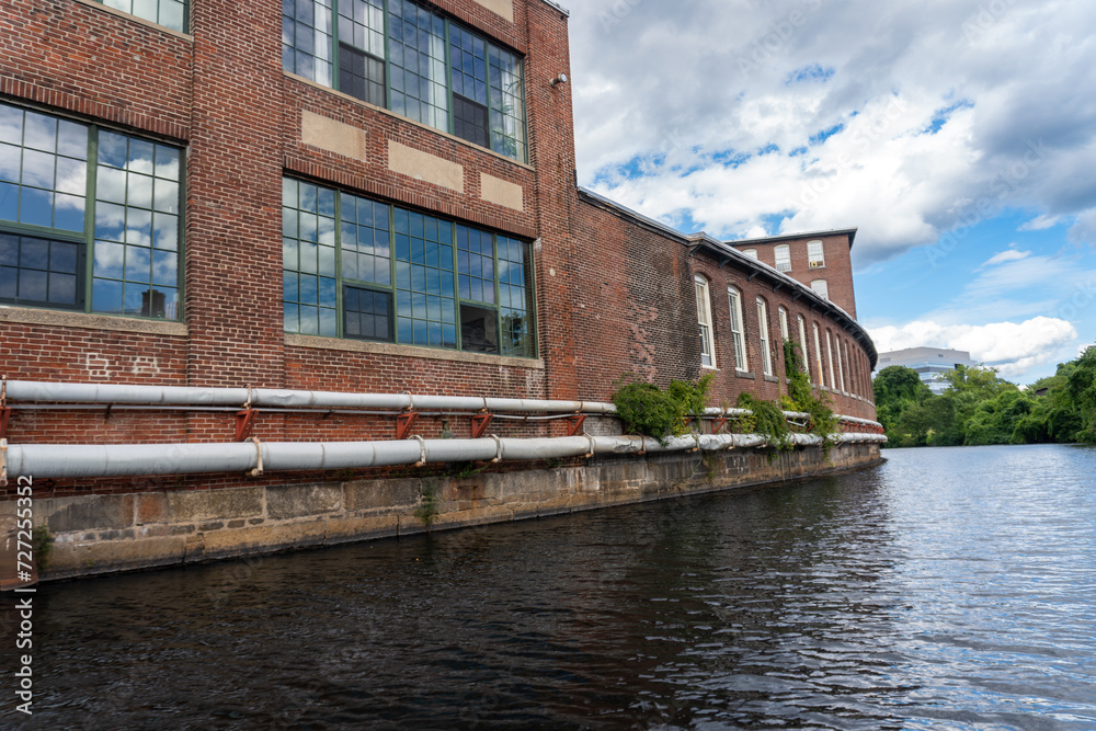Lowell, Massachusetts: Lowell National Historical Park celebrates era of textile manufacturing during the Industrial Revolution. Western Avenue on Pawtucket Canal, converted mill space.