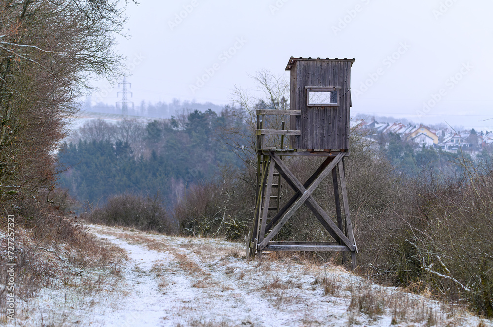 Wooden lookout tower for hunting in the woods and on meadow
Wooden lookout tower for hunting in the woods and on meadow