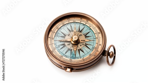 A vintage brass compass with a weathered map isolated on white evoking a sense of exploration