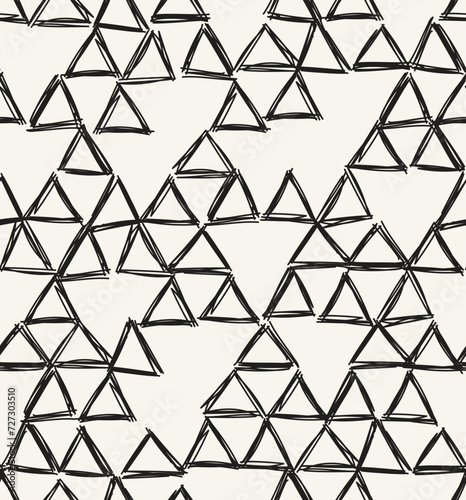 Vector seamless pattern. Hand drawn geometric swatch. Sloppy background with triangular doodles. Creative modern graphic design.	